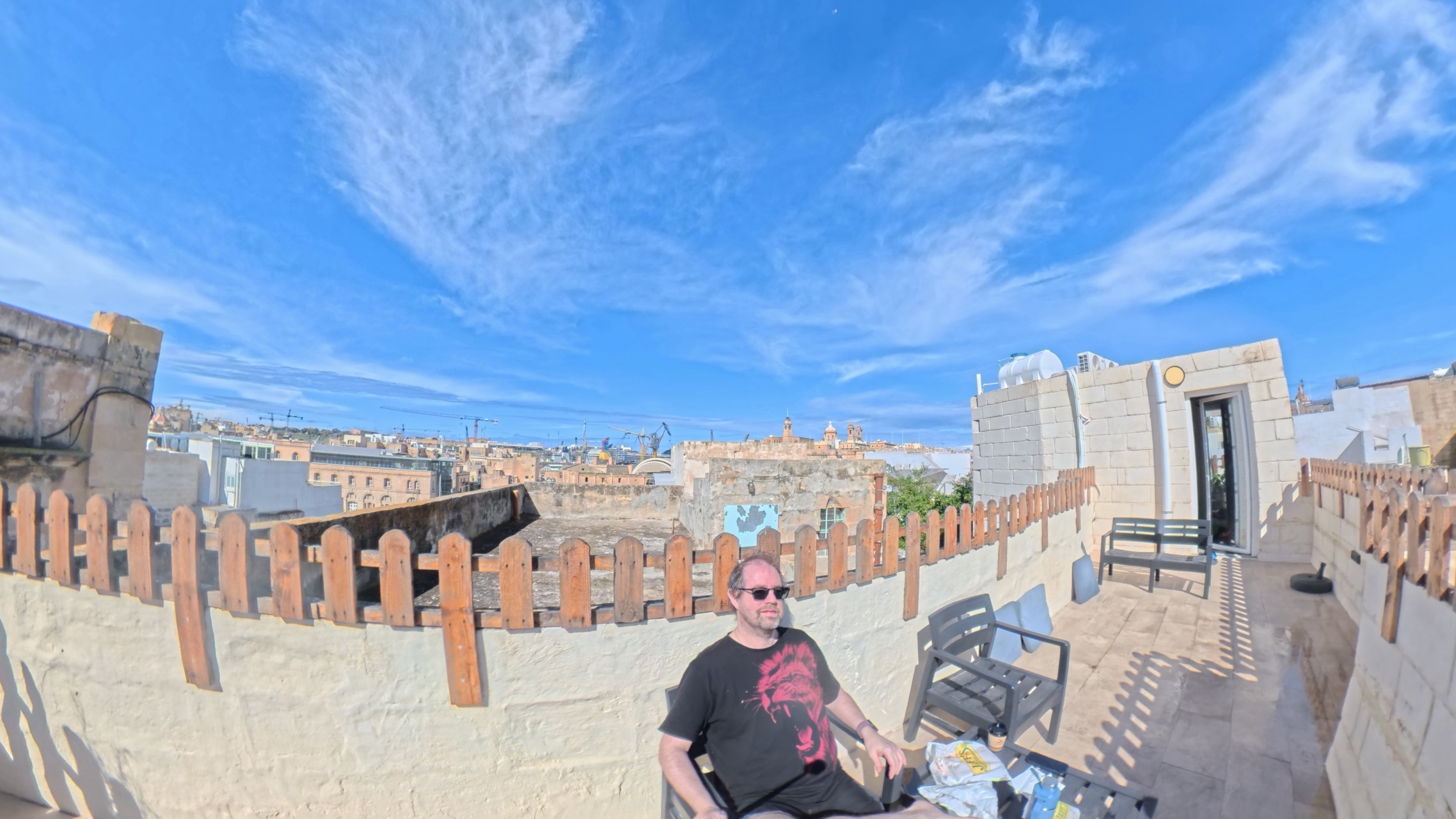 Sat on the roof terrace in the sun